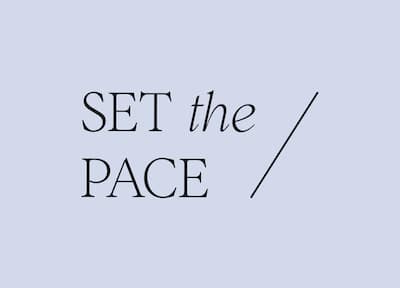 An image with blue-grey background with "set the pace" centered in in large font.